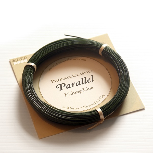 Product photograph of fishing line in green colour with packaging.